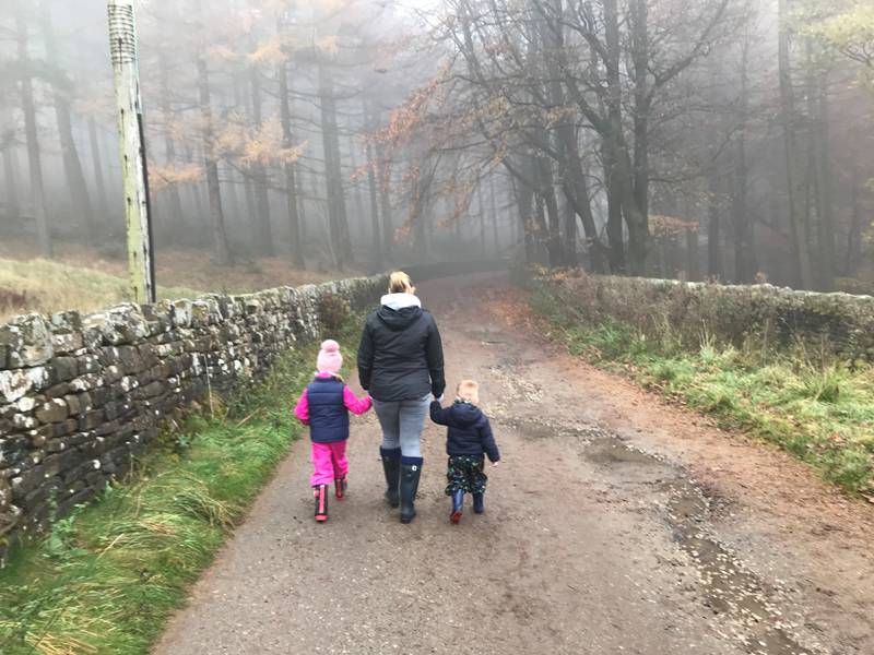 Emma and children walking