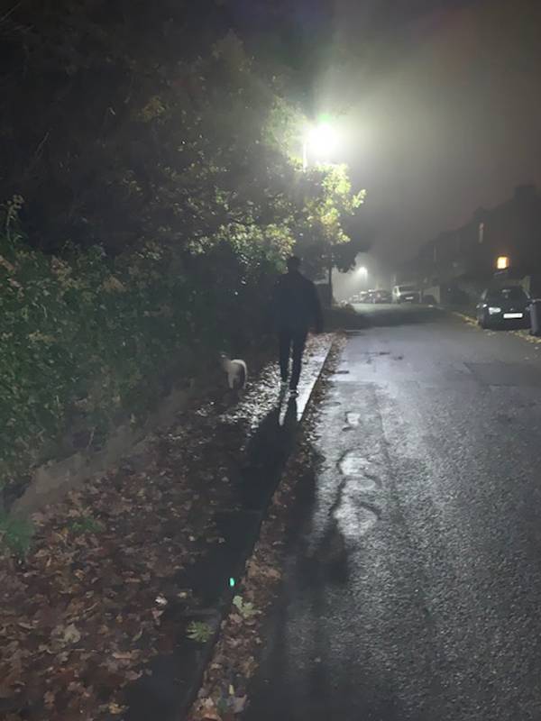 Mike walking at night